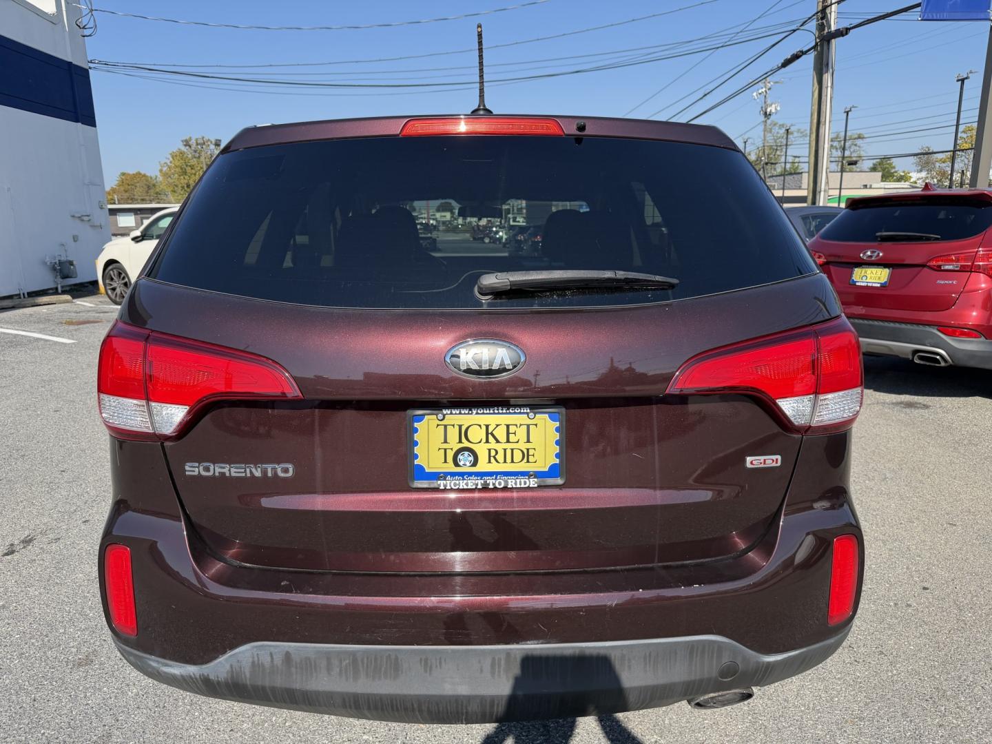 2015 MAROON Kia Sorento LX AWD (5XYKTCA6XFG) with an 2.4L L4 DOHC 16V engine, 6-Speed Automatic transmission, located at 1254 Manheim Pike, Lancaster, PA, 17601, (717) 393-9133, 40.062870, -76.323273 - Make room for your daily routine and weekend adventures in this 2015 Kia Sorento LX AWD! This versatile SUV offers a spacious interior and flexible cargo space for groceries, sports gear, or luggage. All-wheel drive adds traction when road conditions change, while its convenient four-door design mak- Photo#3