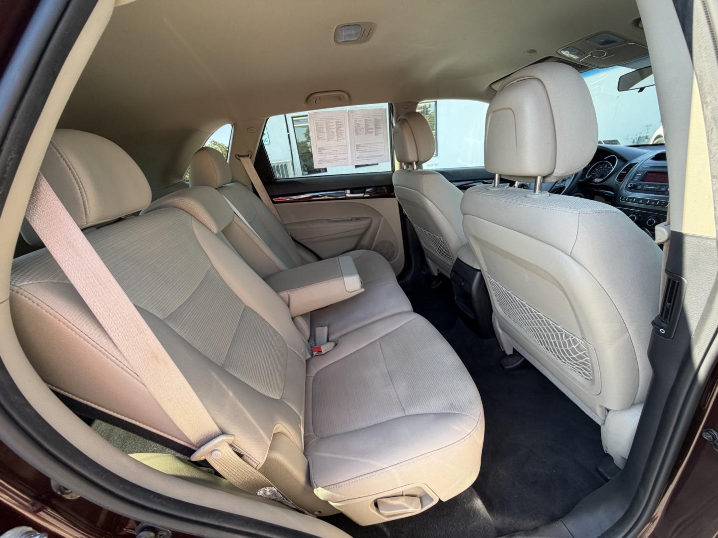 2015 MAROON Kia Sorento LX AWD (5XYKTCA6XFG) with an 2.4L L4 DOHC 16V engine, 6-Speed Automatic transmission, located at 1254 Manheim Pike, Lancaster, PA, 17601, (717) 393-9133, 40.062870, -76.323273 - Make room for your daily routine and weekend adventures in this 2015 Kia Sorento LX AWD! This versatile SUV offers a spacious interior and flexible cargo space for groceries, sports gear, or luggage. All-wheel drive adds traction when road conditions change, while its convenient four-door design mak- Photo#16