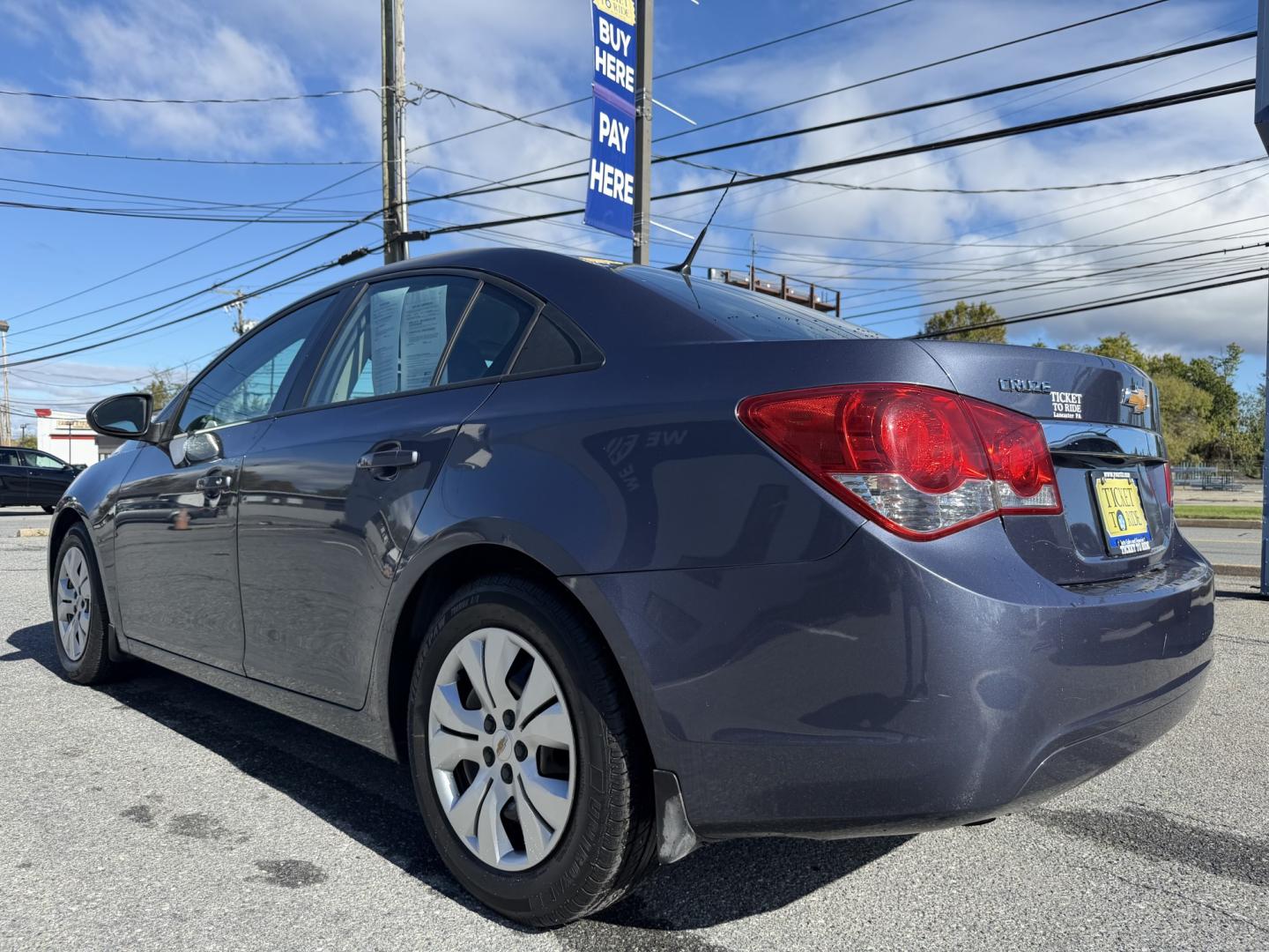 2014 BLUE Chevrolet Cruze LS Auto (1G1PA5SG1E7) with an 1.8L L4 DOHC 16V engine, 6-Speed Automatic transmission, located at 1254 Manheim Pike, Lancaster, PA, 17601, (717) 393-9133, 40.062870, -76.323273 - Bring style and practicality to your daily drive with this 2014 Chevrolet Cruze LS! This compact sedan pairs a sleek four-door design with the convenience of an automatic transmission, making it an appealing choice for commuting through Lancaster, running errands, and weekend outings. Its cabin offe- Photo#2