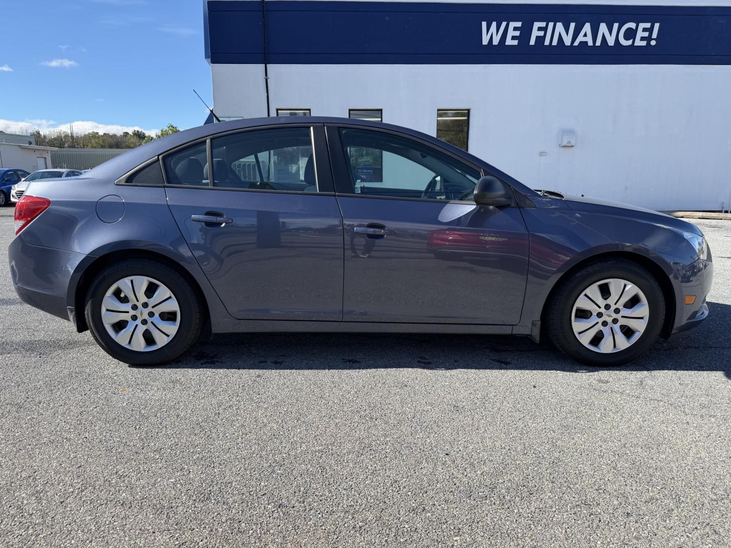 2014 BLUE Chevrolet Cruze LS Auto (1G1PA5SG1E7) with an 1.8L L4 DOHC 16V engine, 6-Speed Automatic transmission, located at 1254 Manheim Pike, Lancaster, PA, 17601, (717) 393-9133, 40.062870, -76.323273 - Bring style and practicality to your daily drive with this 2014 Chevrolet Cruze LS! This compact sedan pairs a sleek four-door design with the convenience of an automatic transmission, making it an appealing choice for commuting through Lancaster, running errands, and weekend outings. Its cabin offe- Photo#5
