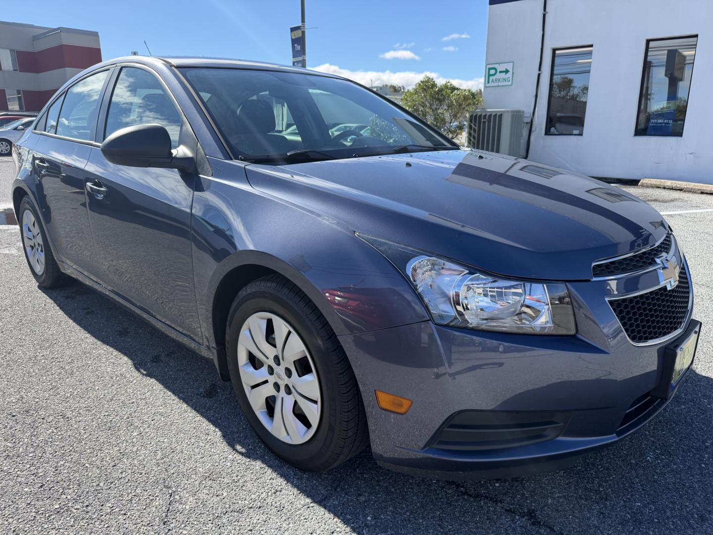 2014 BLUE Chevrolet Cruze LS Auto (1G1PA5SG1E7) with an 1.8L L4 DOHC 16V engine, 6-Speed Automatic transmission, located at 1254 Manheim Pike, Lancaster, PA, 17601, (717) 393-9133, 40.062870, -76.323273 - Bring style and practicality to your daily drive with this 2014 Chevrolet Cruze LS! This compact sedan pairs a sleek four-door design with the convenience of an automatic transmission, making it an appealing choice for commuting through Lancaster, running errands, and weekend outings. Its cabin offe- Photo#6