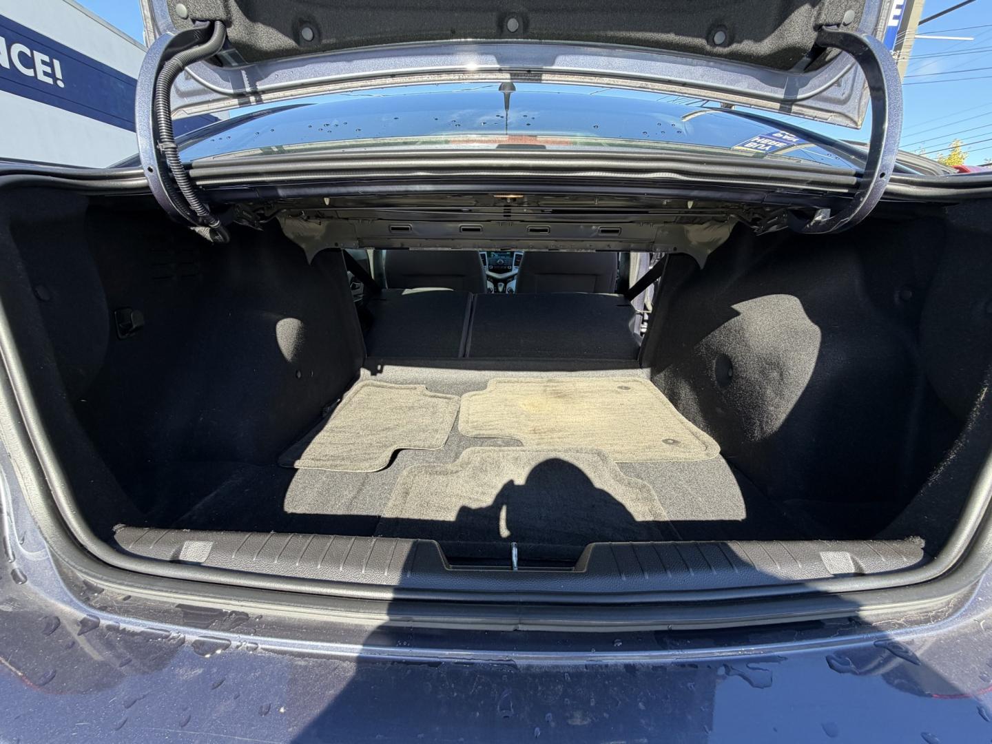 2014 BLUE Chevrolet Cruze LS Auto (1G1PA5SG1E7) with an 1.8L L4 DOHC 16V engine, 6-Speed Automatic transmission, located at 1254 Manheim Pike, Lancaster, PA, 17601, (717) 393-9133, 40.062870, -76.323273 - Bring style and practicality to your daily drive with this 2014 Chevrolet Cruze LS! This compact sedan pairs a sleek four-door design with the convenience of an automatic transmission, making it an appealing choice for commuting through Lancaster, running errands, and weekend outings. Its cabin offe- Photo#17