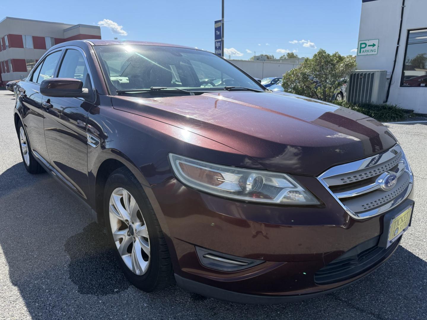2012 MAROON Ford Taurus SEL FWD (1FAHP2EWXCG) with an 3.5L V6 DOHC 24V engine, 6-Speed Automatic transmission, located at 1254 Manheim Pike, Lancaster, PA, 17601, (717) 393-9133, 40.062870, -76.323273 - Enjoy comfort and style in this 2012 Ford Taurus SEL FWD! With a spacious interior and generous trunk space, this sedan is a practical choice for your daily commute, family outings, and weekend trips. Visit Ticket To Ride Auto Sales in Lancaster to take a closer look and explore financing options fo- Photo#4