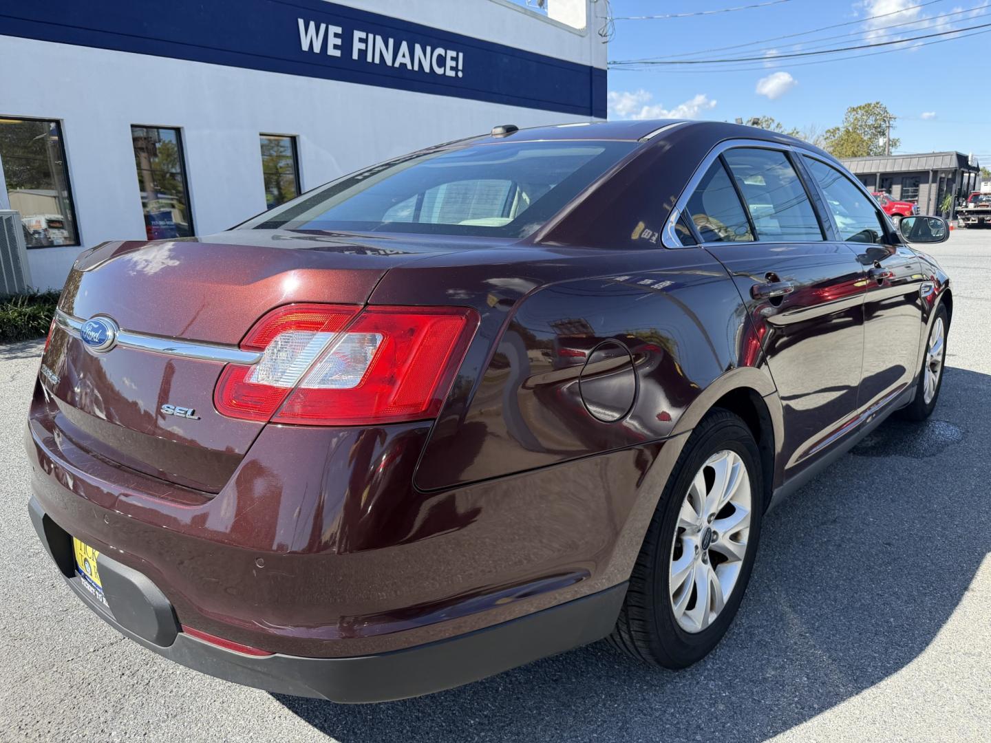 2012 MAROON Ford Taurus SEL FWD (1FAHP2EWXCG) with an 3.5L V6 DOHC 24V engine, 6-Speed Automatic transmission, located at 1254 Manheim Pike, Lancaster, PA, 17601, (717) 393-9133, 40.062870, -76.323273 - Enjoy comfort and style in this 2012 Ford Taurus SEL FWD! With a spacious interior and generous trunk space, this sedan is a practical choice for your daily commute, family outings, and weekend trips. Visit Ticket To Ride Auto Sales in Lancaster to take a closer look and explore financing options fo- Photo#6