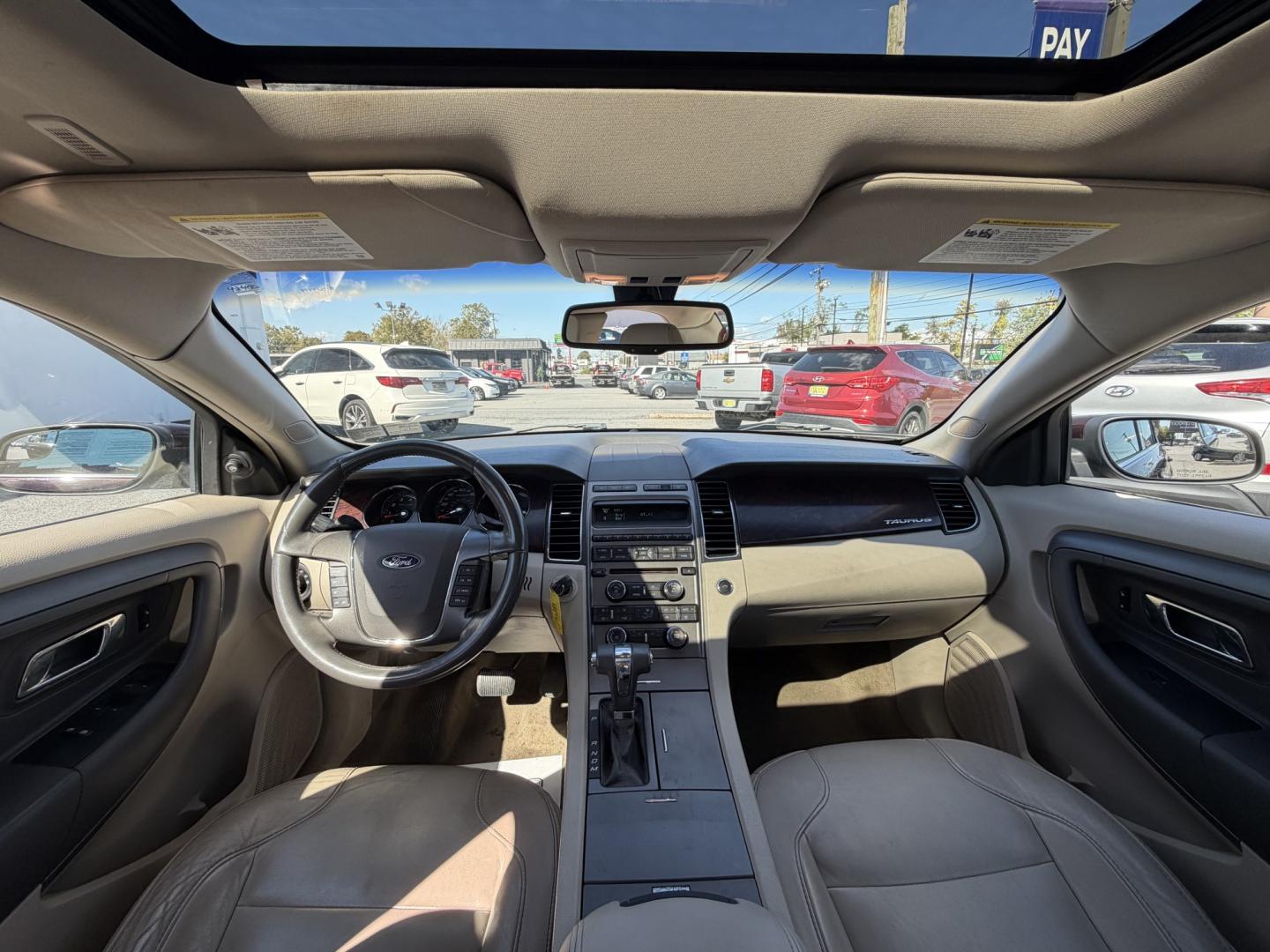 2012 MAROON Ford Taurus SEL FWD (1FAHP2EWXCG) with an 3.5L V6 DOHC 24V engine, 6-Speed Automatic transmission, located at 1254 Manheim Pike, Lancaster, PA, 17601, (717) 393-9133, 40.062870, -76.323273 - Enjoy comfort and style in this 2012 Ford Taurus SEL FWD! With a spacious interior and generous trunk space, this sedan is a practical choice for your daily commute, family outings, and weekend trips. Visit Ticket To Ride Auto Sales in Lancaster to take a closer look and explore financing options fo- Photo#7