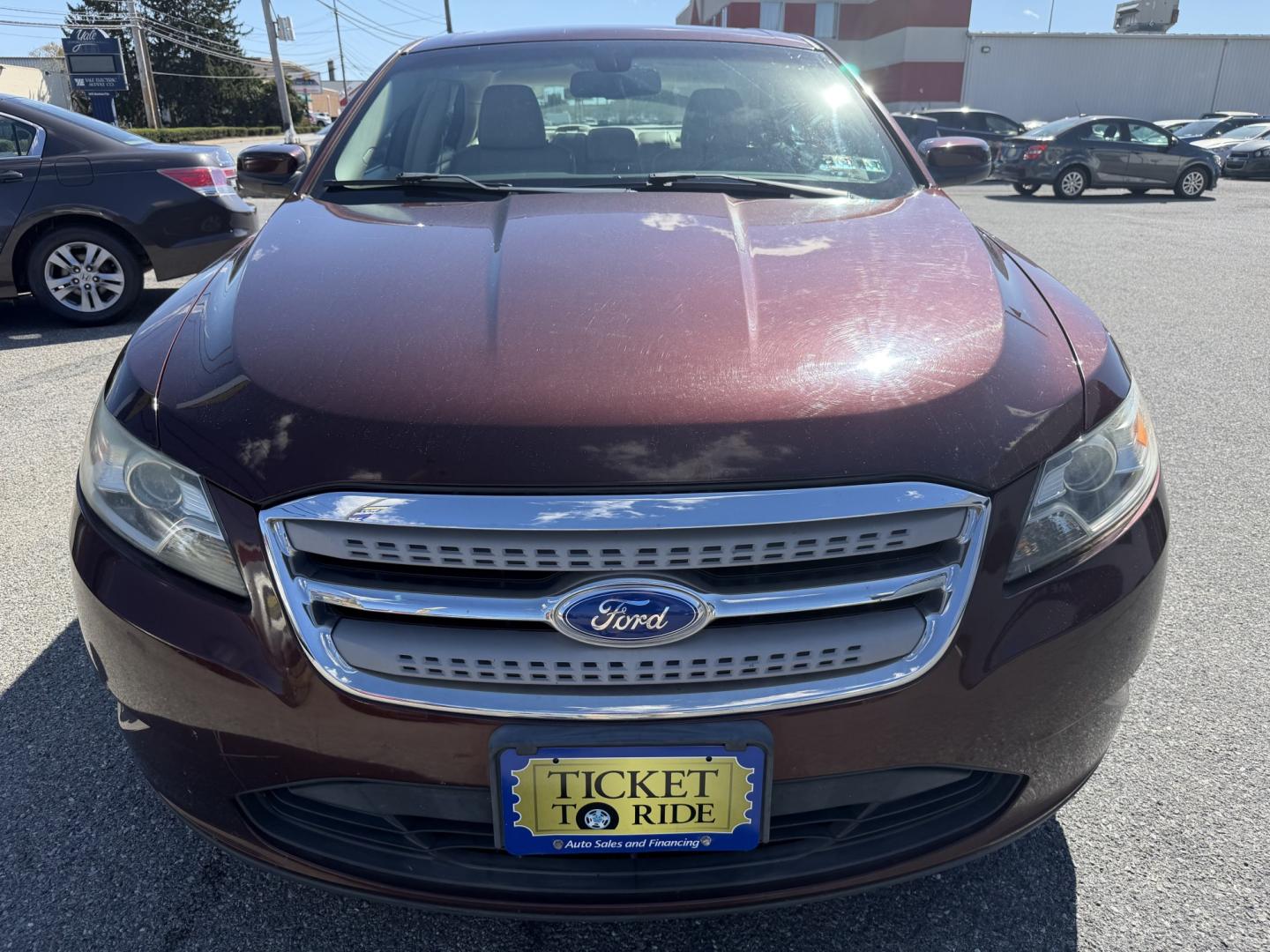 2012 MAROON Ford Taurus SEL FWD (1FAHP2EWXCG) with an 3.5L V6 DOHC 24V engine, 6-Speed Automatic transmission, located at 1254 Manheim Pike, Lancaster, PA, 17601, (717) 393-9133, 40.062870, -76.323273 - Enjoy comfort and style in this 2012 Ford Taurus SEL FWD! With a spacious interior and generous trunk space, this sedan is a practical choice for your daily commute, family outings, and weekend trips. Visit Ticket To Ride Auto Sales in Lancaster to take a closer look and explore financing options fo- Photo#9