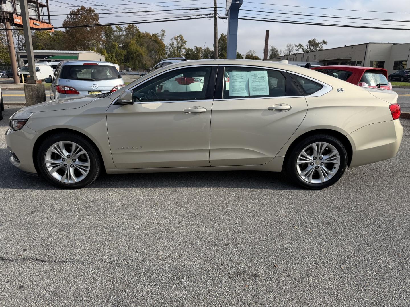 2014 GOLD Chevrolet Impala 2LT (2G1125S30E9) with an 3.6L V6 DOHC 16V FFV engine, 6-Speed Automatic transmission, located at 1254 Manheim Pike, Lancaster, PA, 17601, (717) 393-9133, 40.062870, -76.323273- Photo#1